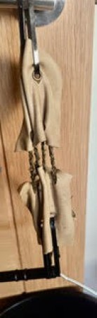 Control: The nettle partially held the leather squares together.